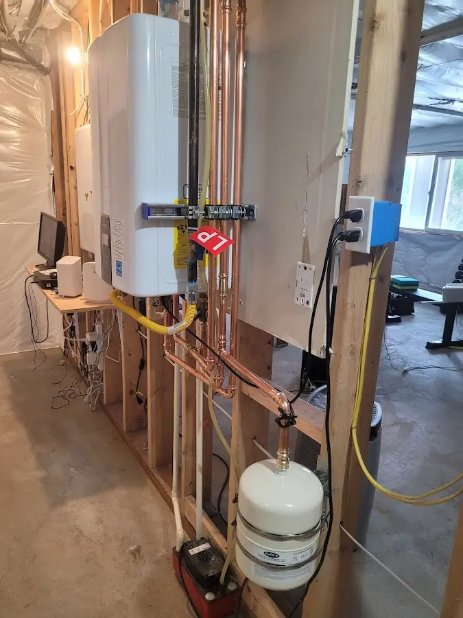 Licensed plumber repairing a kitchen sink in Glen Burnie